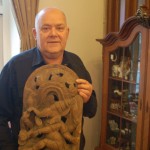 Lennart Mårtensson with a carving of Ganesha from India, one of the collection of elephants at his inn in Sjöbo.